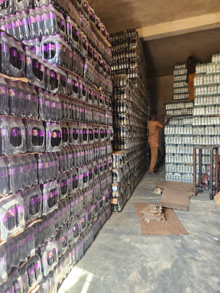 Bigi drinks and malt beverage crates stacked in the warehouse